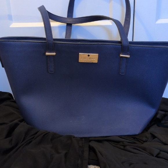 kate spade Handbags - kate spade navy blue tote with gold plaque